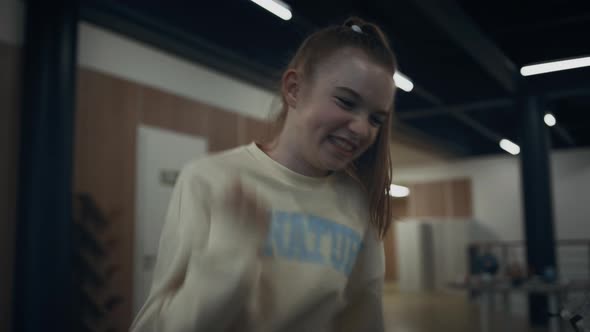 Happy School Girl Playing Table Foosball Closeup