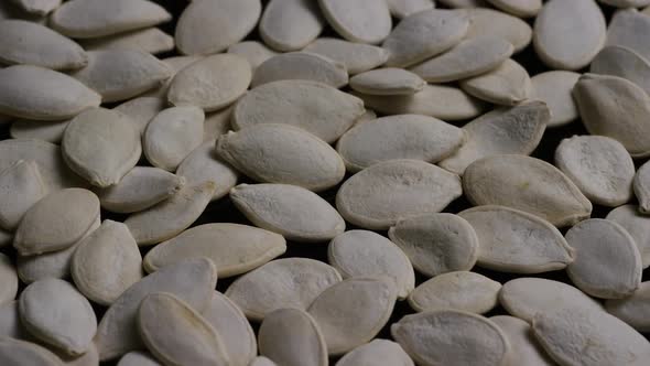 Cinematic, rotating shot of pumpking seeds - PUMPKIN SEEDS 011