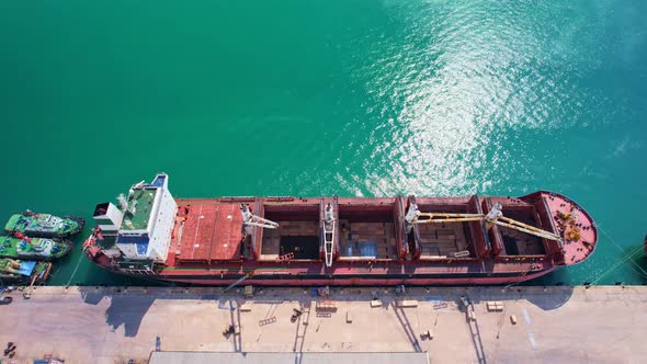 Aerial view of cargo ship carrying container.Container ship loading and unloading in deep sea port,