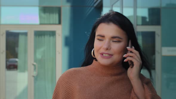 Closeup Successful Confident Businesswoman Walking Outdoors Talking on Phone Answering Business Call