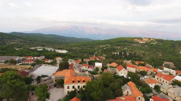 Aerial drone shot of the outskirt by the hillside of Sumartin Brac Island Croatia