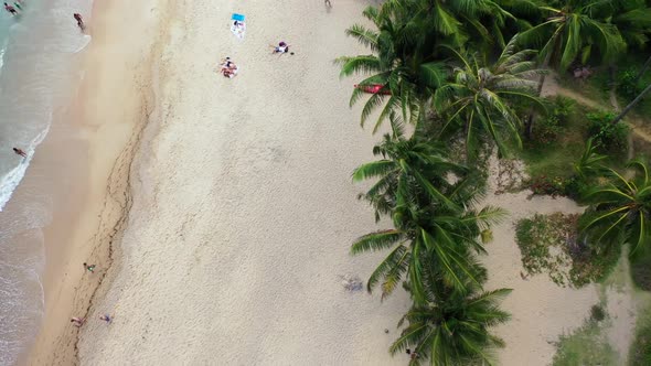 Aerial texture of luxury coastline beach vacation by blue green ocean with white sandy background of