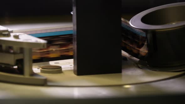 Film Runs Through a 35Mm Projector in a Movie Theater