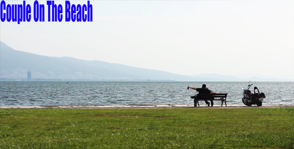 Couple  On The Beach