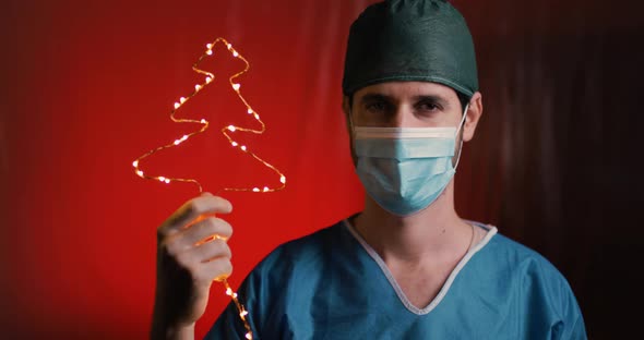 Doctor Young Boy celebrates Christmas at the time of Coronavirus