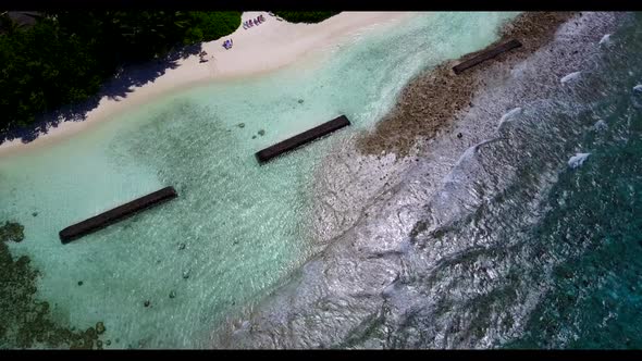 Aerial above landscape of beautiful lagoon beach adventure by turquoise ocean and white sand backgro