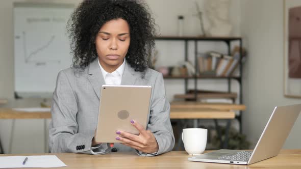 African Businesswoman Using Tablet