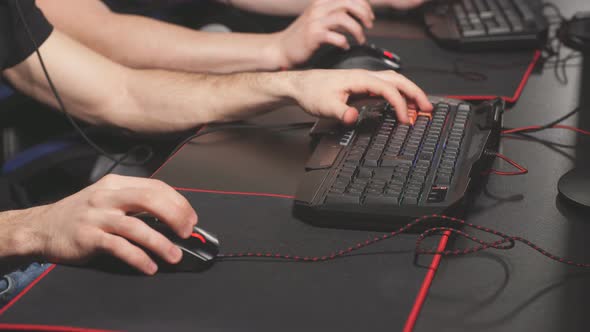 Close Up Gamers Hands Pushing Buttons on Keyboards, Working, Betting, Playing.