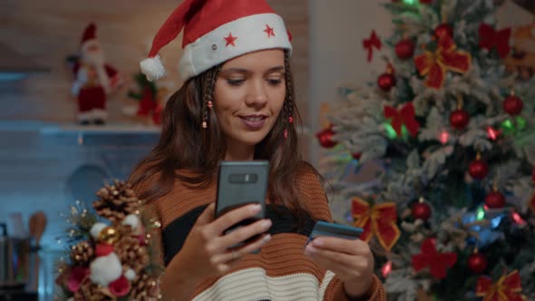 Happy Woman Looking for Christmas Gifts