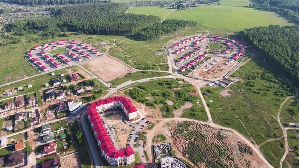 Aerial View of New Cottages Modern Townhouses in a Suburban Community