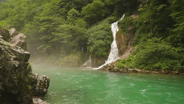 Waterfall with Mountain River in Montenegro.