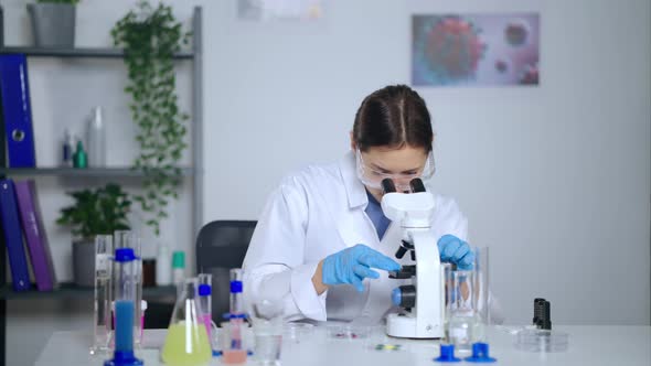 Female Medical Researcher Working in the Laboratory