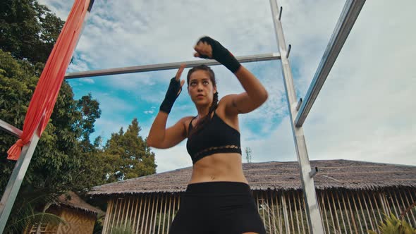 Woman Fighter Trains Her Punches Training Day in the Abandoned Hotel Strength Fit Body