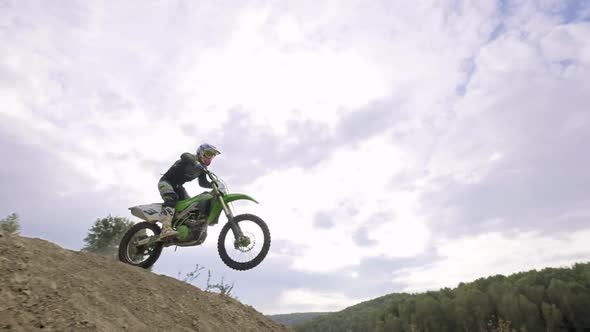 Rider On Sports Motorcycle Descends Hill