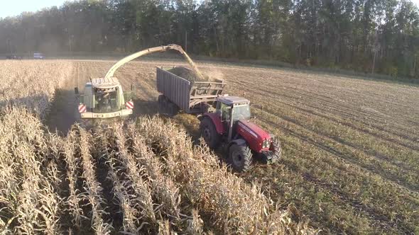 Aerial shot of farmwork on gathering crops