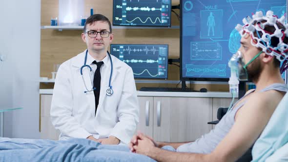 Doctor in a Brain Clinic Making Rotation Hand Gesture in the Air