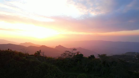 4K Aerial view over the mountains at sunset. Drone Flight Footage