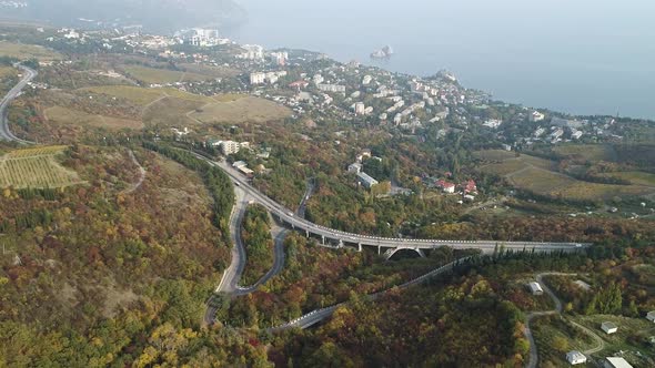 Aerial Landscape View Of A Beautiful Bay With Forest And Hills