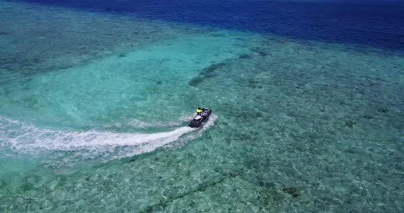 Luxury drone island view of a sandy white paradise beach and blue water background 