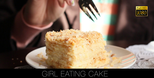 Girl Eating Cake