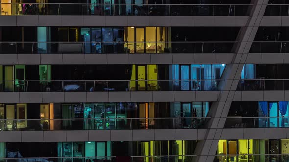 Night View of Glowing Windows in Apartment Tower Timelapse