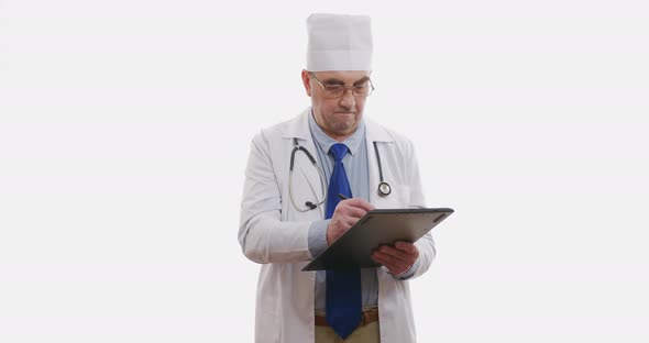 Doctor Standing Uses Tablet Computer, Close Up, 6K. Isolated on White