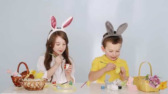 Funny Children in Bunny Ears Getting Ready for Easter Holiday