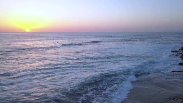 Slow motion of surfer paradise on earth. Buttery soft aerial view flight panorama curve flight drone