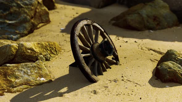 Old Wooden Cart Wheel at Sand Beach