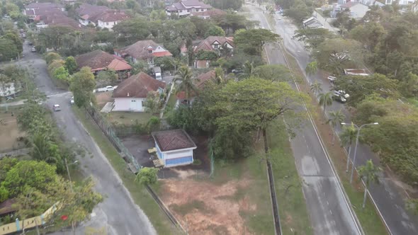 Aerial view of blue car moving on the road in Kajang, Selangor