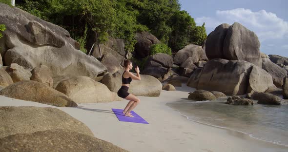 Morning Exercises on the Beach, Young Female Hard Exercise on Sunrise