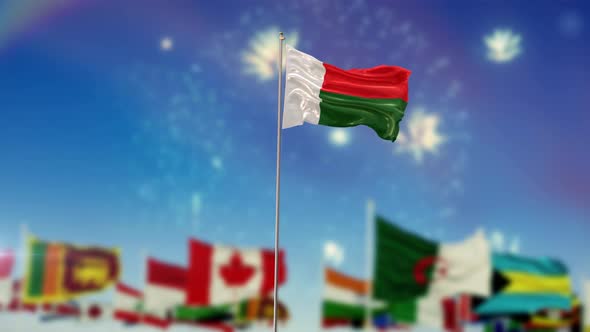 Madagascar Flag With World Globe Flags And Fireworks