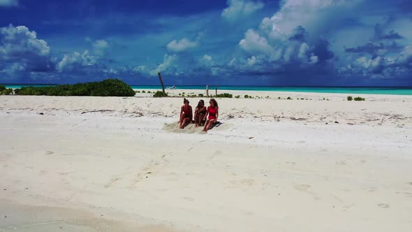 Beautiful ladies look beautiful on paradise seashore beach time by blue sea and white sand backgroun