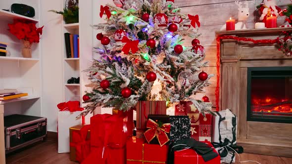 Red Gift Boxes Under Christmas Tree for Winter Holiday