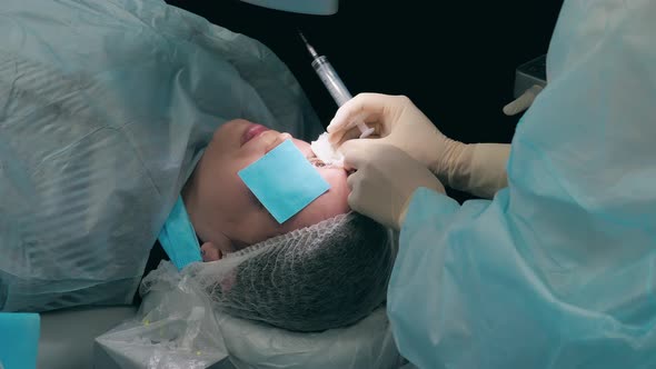 Patient is Getting Her Eyes Anaesthetized During Surgery