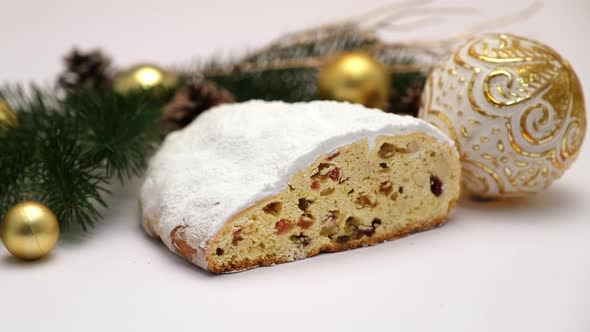 Sliced Traditional Christmas Stollen Cake with Marzipan and Dried Fruit