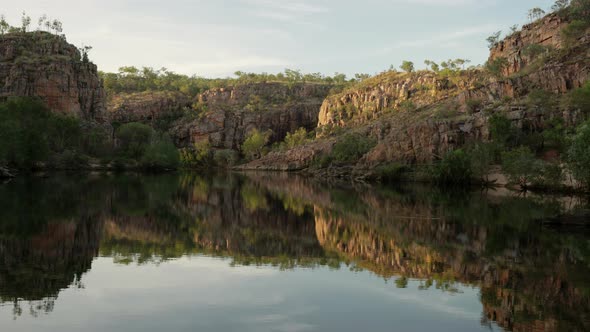 sunrise shot of reflections on the water of nitmiluk-katherine gorge