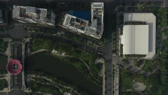 Top down aerial view of ultra modern lakeside housing and apartment development on a sunny day with