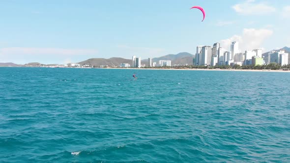 Extreme Water Sport and Summer Vacations Concept, Professional Kite Surfer on the Sea Wave, Athlete