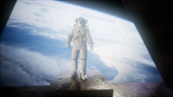 Astronaut on the Space Observatory Station Near Earth