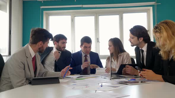 business meeting-company managers check the report data