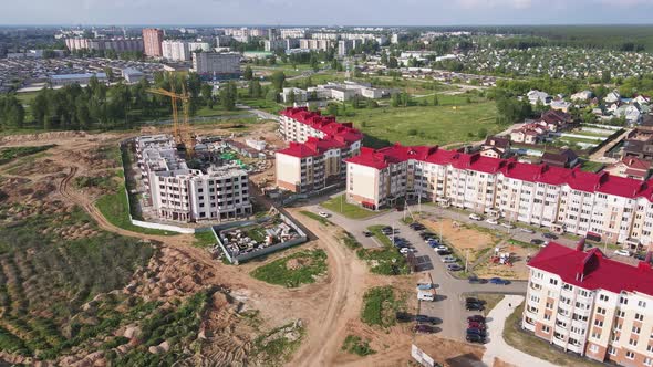 Aerial View of a Modern Apartment Building Under Construction