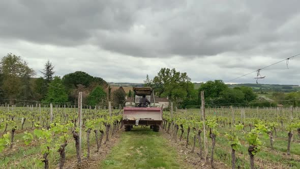 farmer rides a tractor