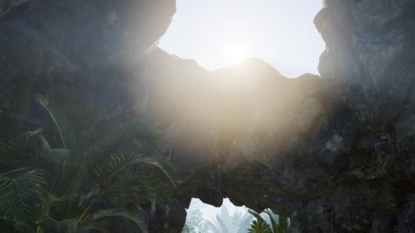 Sunlight Through the Chimney Cave in Thailand alt