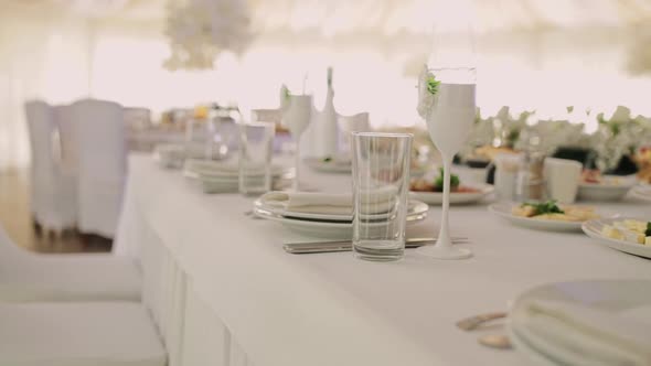banquet hall in the restaurant with food and drink and decor