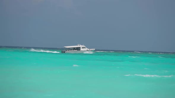 Boat in Blue Ocean