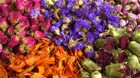 Flower teas on a wooden board