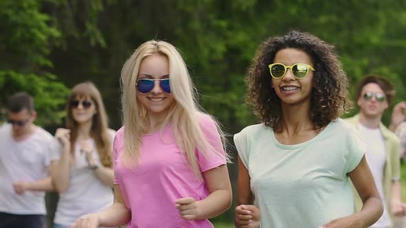 Couple of Hot Girls Dancing With Friends at Open Air Festival, Enjoying Summer