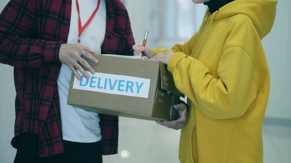 Client Gets a Parcel After Signing Dispatch Documents