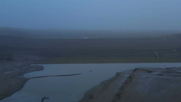 Flight Over A Dry Dam In The Autumn Foggy Day In The Late Afternoon 3